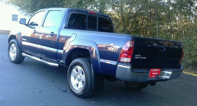 2005 Toyota Tacoma 2011 Kia SX