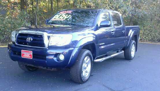 2005 Toyota Tacoma 2011 Kia SX