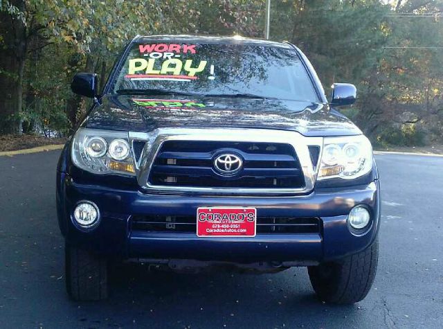 2005 Toyota Tacoma 2011 Kia SX
