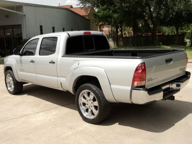 2006 Toyota Tacoma 2011 Kia SX