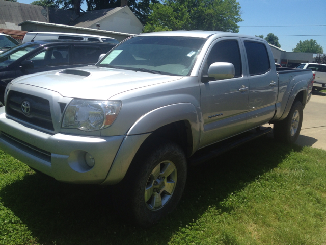 2007 Toyota Tacoma 2011 Kia SX