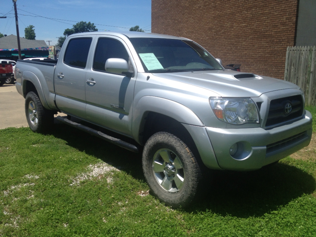 2007 Toyota Tacoma 2011 Kia SX
