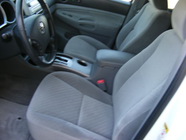 2010 Toyota Tacoma 2010 Cadillac CTS