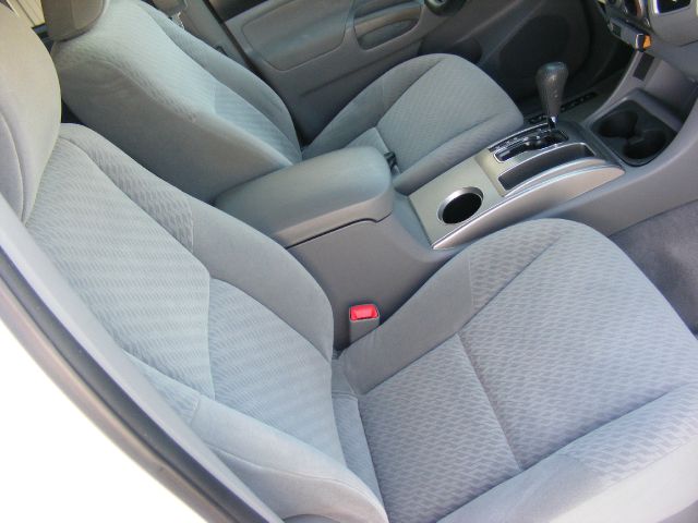 2010 Toyota Tacoma 2010 Cadillac CTS