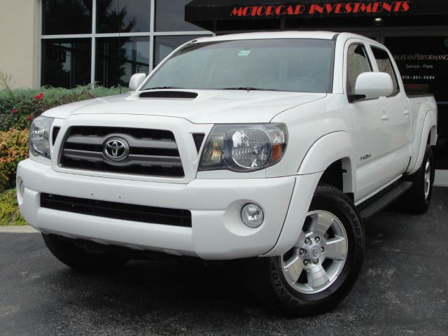 2010 Toyota Tacoma 2011 Kia SX