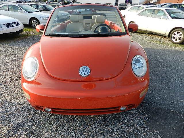 2004 Volkswagen New Beetle 2004 GMC 1500 SLE