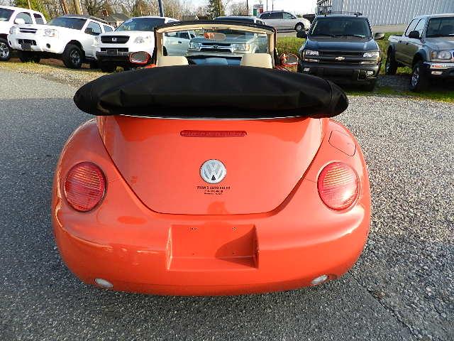 2004 Volkswagen New Beetle 2004 GMC 1500 SLE